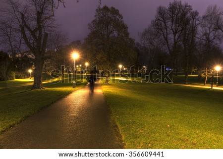 A road in the beautiful park Letna in Prague (Czech republic) at night in an HDR long exposure photo
