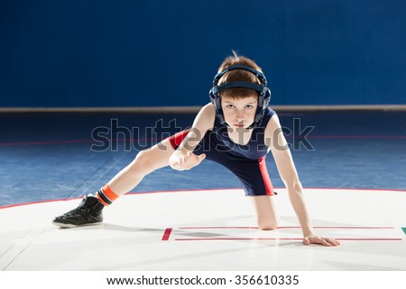 Youth wrestler in a stance