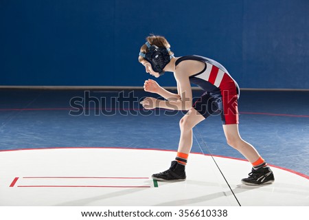 Youth wrestler in a stance