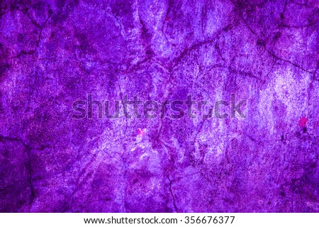 Purple concrete wall background abstract.