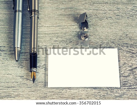 pen, badge, blank ID card or security, macro, view from above, retro style