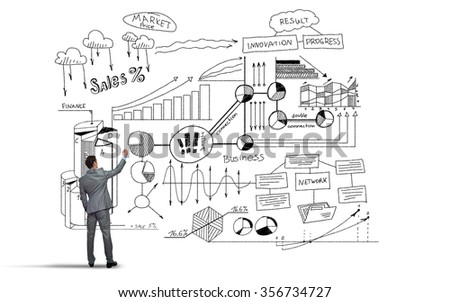 Rear view of businessman isolated on white background writing business strategy sketches