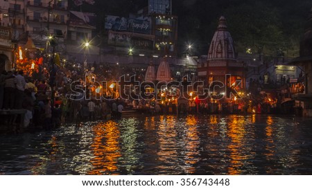 Sandhya Aarti,Haridwar
Every evening priest perform sandhya(evening) aarti of river Ganga with large fire tray and gong.People from various parts of India and even from abroad come  for aarti. Royalty-Free Stock Photo #356743448