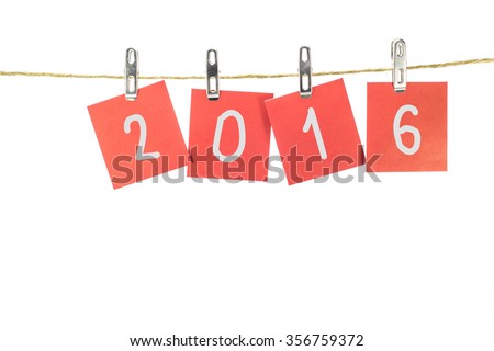 new year 2016 word hanging on the Notes paper cards in clothes pegs on rope with isolate
