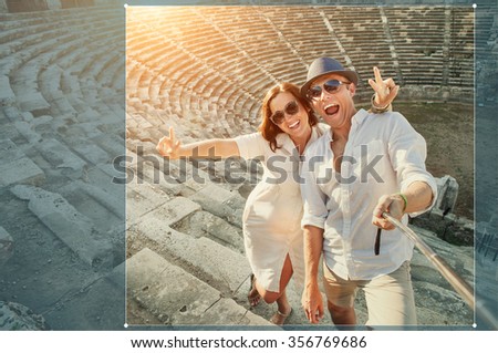 Happy young couple take self photo in Side amphitheatre