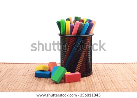 Assortment of school items on wooden background