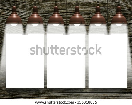 Close-up of three hanged paper sheet frames with six lamps on wood background