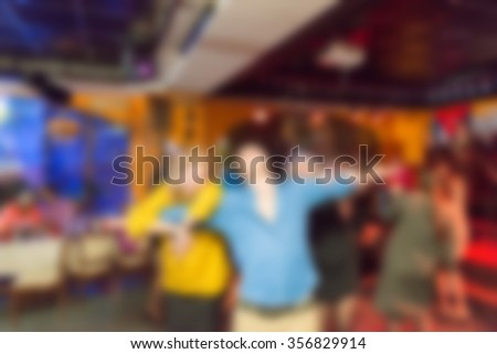 Party at the bar theme creative abstract blur background with bokeh effect