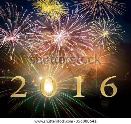 Text for 2016 over fireworks on night background.