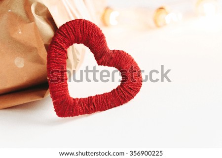 Stylish craft presents with red heart, happy valentine's day, holiday greeting card concept