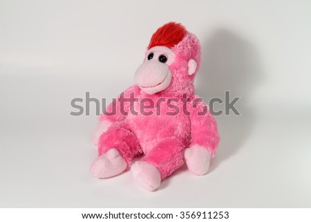 Cute monkey doll on white background