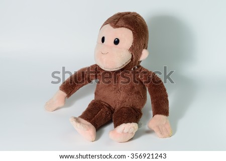 Cute monkey doll on white background
