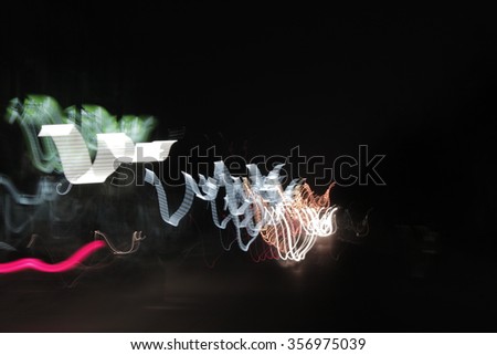 Long shoot light abstract background , Shooting by setup camera behind the car moving in the night.
