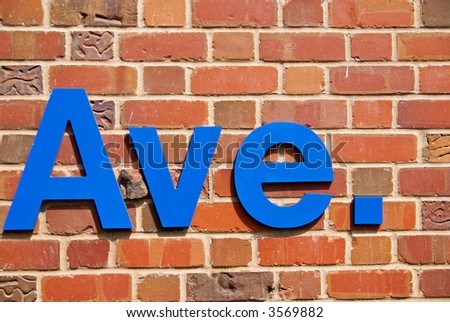 Brick wall with inscription "Ave."
