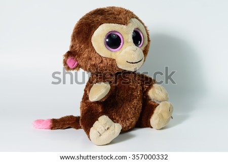 Cute monkey doll on white background
