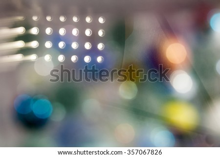 Abstract underwater composition with colorful glass balls, water and led lights reflected in