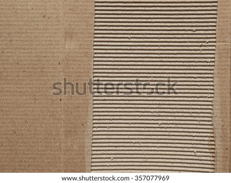 Torn cardboard sheet, brown paper box texture