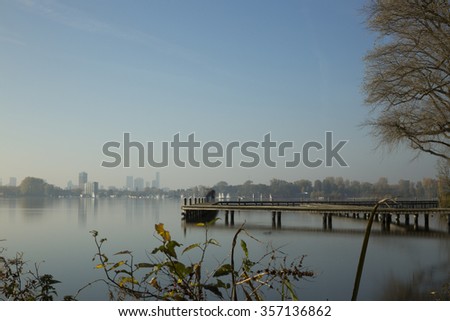  City skyline seen from a Lake. Picture taken at a lake near Rotterdam in the Netherlands.