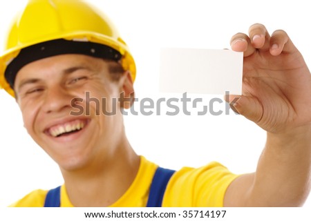 Worker showing his business card and smile, isolated over white