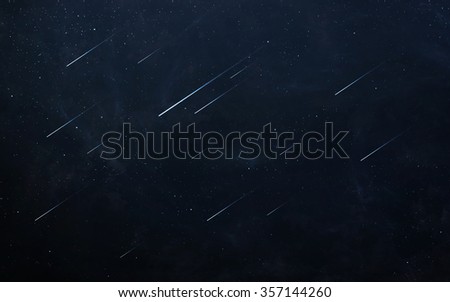 Glowing asteroids in space. Elements of this image furnished by NASA