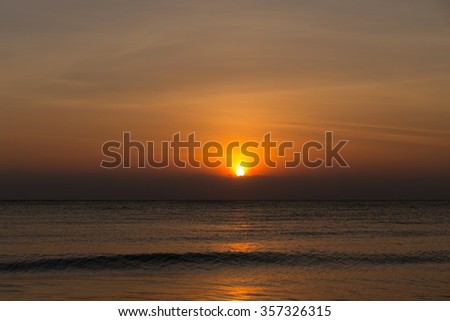 Image of sunrise over sea, morning sky.