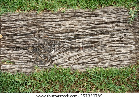 Old wooden railway sleeper path texture in the garden