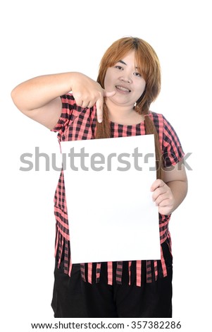 Asian plump woman standing and showing empty vertical blank paper in hands, isolated on white background.