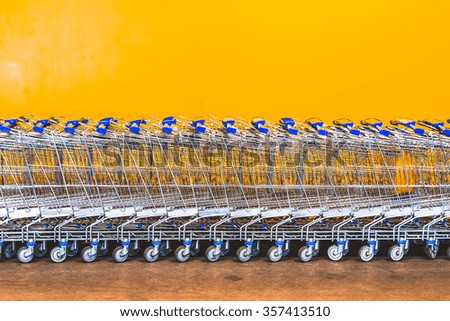 scene of a lot of carts  with many dye color background.