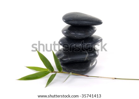 Black zen stones with bamboo leaf
