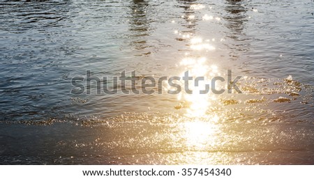 Winter landscape with sun and frozen river. Sunrise,horizontal photo