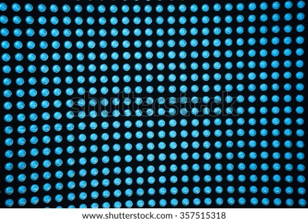 blue dot pattern on black background