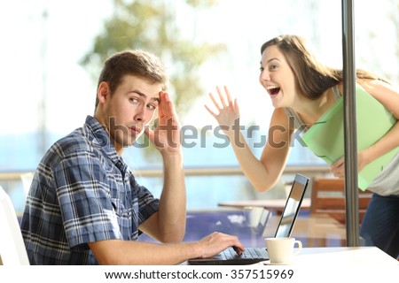 Man ignoring and rejecting to a stalker woman in a coffee shop Royalty-Free Stock Photo #357515969