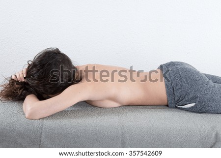 Picture of a happy beautiful woman in massage salon
