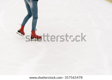 stylish happy skater on a white skating rink in a city center, health activity and celebration holidays concept