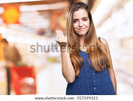young woman doing a rich gesture