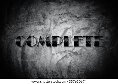 Complet Concept - Complet sign on old cement black wall