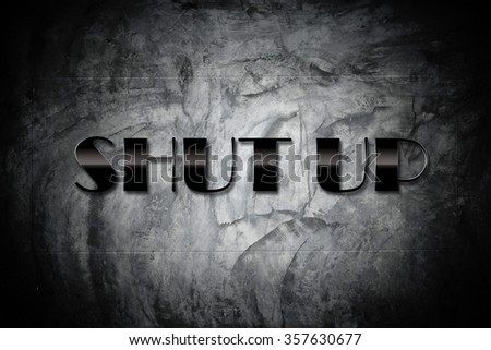 Shut up Concept - Shut up sign on old cement black wall