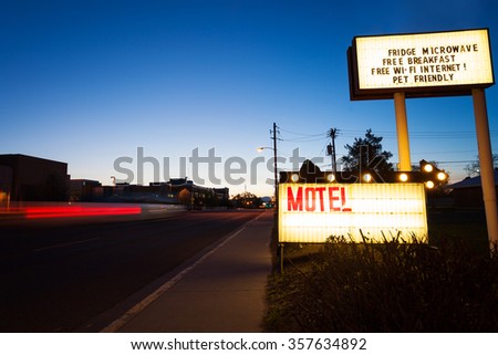 Generic Motel sign in the dusk on road