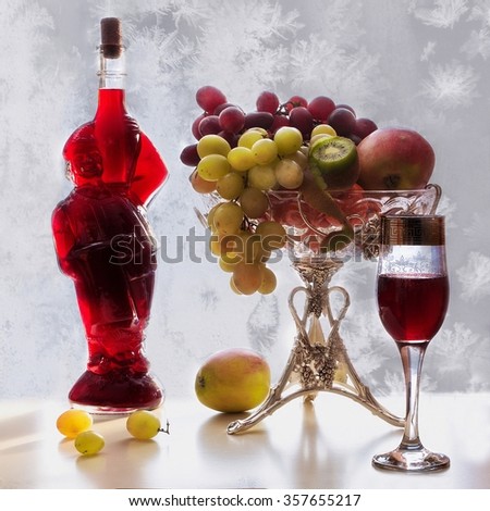 Winter still life with fruit and wine