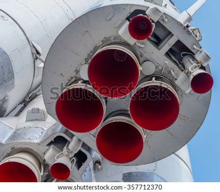 Closeup photo of old and rusty space rocket engine.