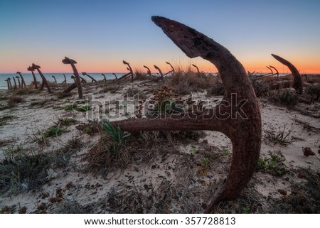 Portuguese beach cemetery anchors. Sunset.