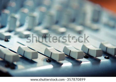 Gray faders on the panel, slightly blurred background