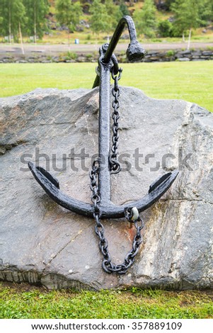 Old Steel anchor on the rock