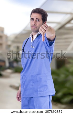 Handsome doctor male nurse working