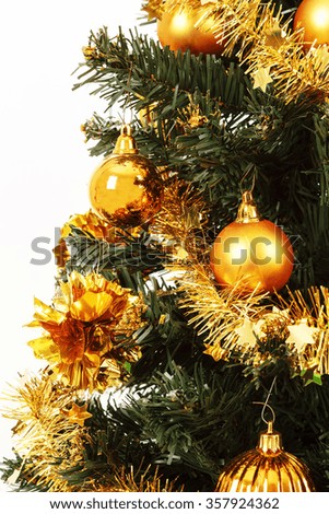 yellow decorated christmas tree on white background
