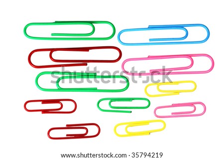 paper clips green blue red pink on white background