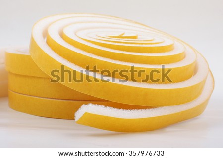 Sealing tape for windows and doors in a roll isolated on white background Royalty-Free Stock Photo #357976733