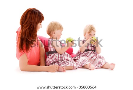 picture of two adorable twins with mother over white