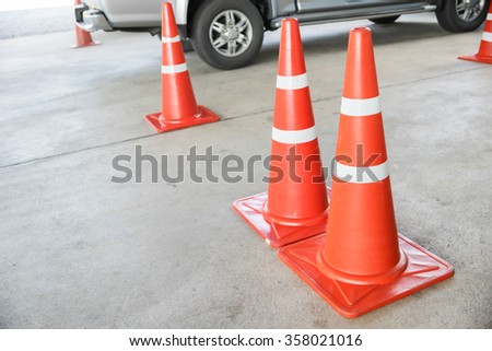 Orange traffic reflective cone