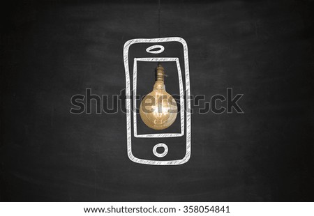 Light bulbs MOBILE on Blackboard , business concept , business idea